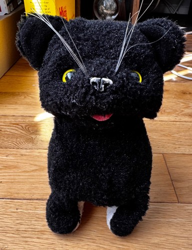 Black electronic cat walking
